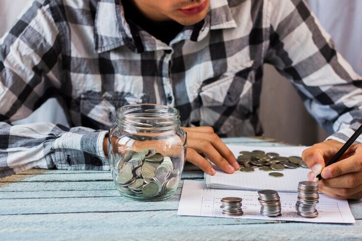 jar with savings coins table e1717163217305