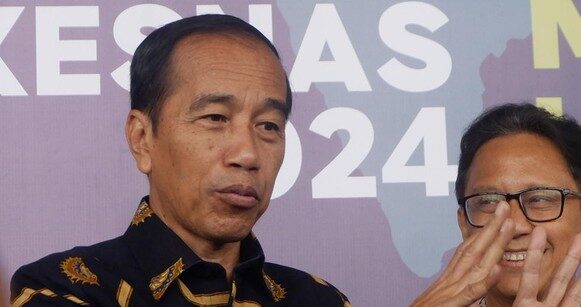 Diteken Jokowi, Jabatan Kepala Desa Bisa Menjadi 16 Tahun, Photo CNN Indonesia