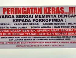 Spanduk Peringatan Keras Warga Sergai terhadap Maraknya Judi di Wilayah Polres Sergai